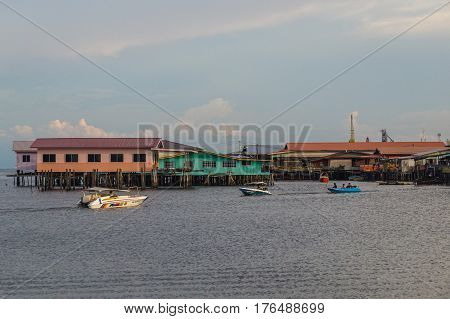 Labuan,Malaysia-March 15,2017:Evening scene of daily activities at Patau-Patau water village in Labuan,Malaysia.Patau-Patau water village is among famous place in Labuan Pearl Of Borneo,Malaysia.