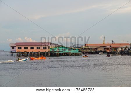 Labuan,Malaysia-March 15,2017:Evening scene of daily activities at Patau-Patau water village in Labuan,Malaysia.Patau-Patau water village is among famous place in Labuan Pearl Of Borneo,Malaysia.