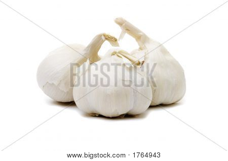 Three Garlic Bullbs On White
