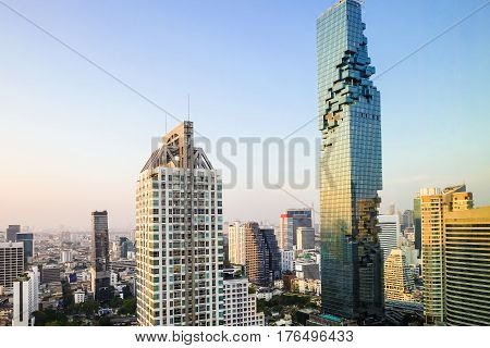 Bangkok Twilight Cityscape Of Mahanakorn Tower With Sun Light