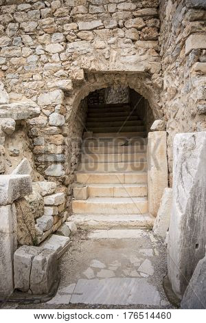 Steps and archway entrance to the odeon theatre in the ancient city of Ephesus Selcuk Turkey