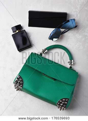 Small Womans Leather Green Bag With Sunglasses, Perfume And Case