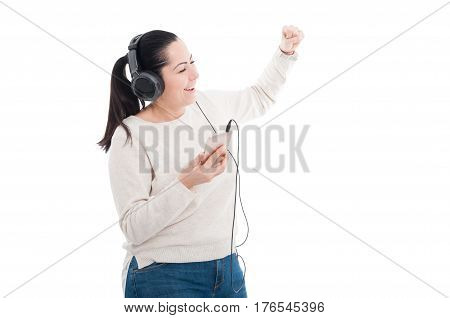 Joyful Female Listening Music And Dancing