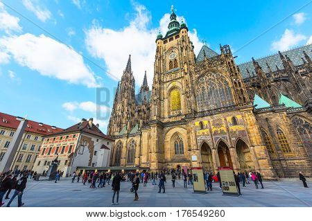 Prague, Czech Republic - February 25, 2017: Famous landmark of Prague St. Vitus Cathedral and people at the square