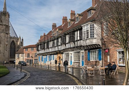 YORK/ UNITED KINGDOM - MARCH 6, 2017: Popular outside cafe near St. William's College and York Minster on a College Street