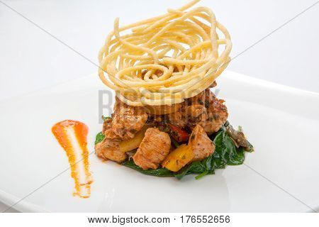 Fried Chicken In Sweet And Sour Sauce With French Fries.