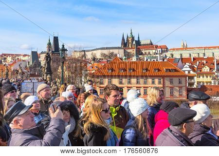 Prague, Czech Republic - February 25, 2017: People at panorama viewpoint and famous landmarks of Prague panoramic view
