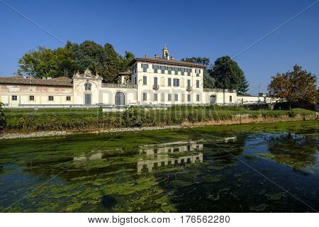 Cassinetta di Lugagnano (Milan Lombardy Italy): facade of the historic Villa Visconti Maineri along the canal known as Naviglio Grande of Turbigo