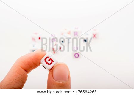 Colorful Alphabet Letter Cubes In Hand