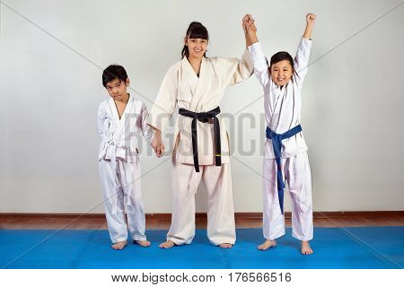 Coach Woman Raises Her Hand To The Winner Of The Sparring