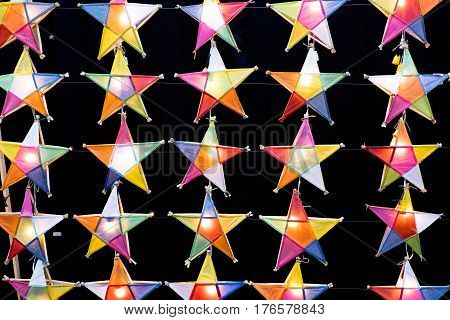 Multi colored star lamps and  background .