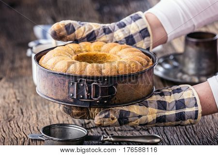 Marble cake.Easter Cake. Marble cake cup of coffee powder sugar and kitchen vintage utensil.