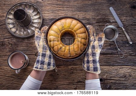 Marble cake.Easter Cake. Marble cake cup of coffee powder sugar and kitchen vintage utensil.