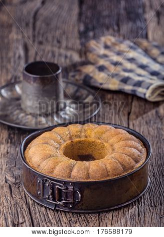 Marble cake.Easter Cake. Marble cake cup of coffee powder sugar and kitchen vintage utensil.