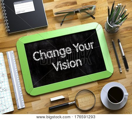 Change Your Vision - Text on Small Chalkboard.Change Your Vision Handwritten on Green Small Chalkboard. Top View of Wooden Office Desk with a Lot of Business and Office Supplies on It. 3d Rendering.