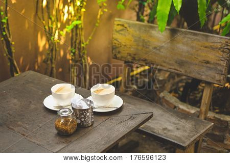 mpty cups of coffee on the table.