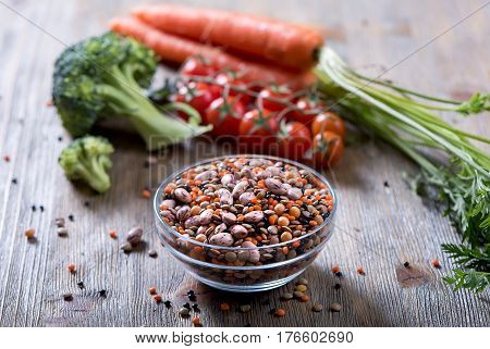 Lentils and beans in bowl vegan and vegetarian cooking ingredients with vegetables healthy food clean eating vegan protein