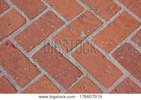Closeup of Design on a Red Brick Walkway