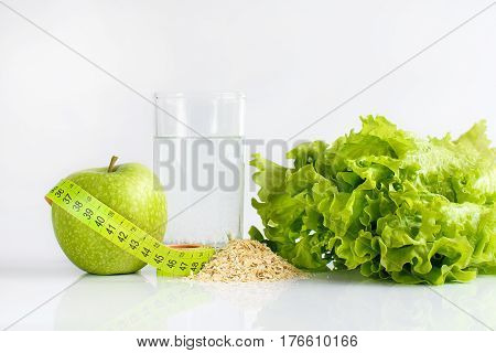 Green apple tape-line still water and lettuce