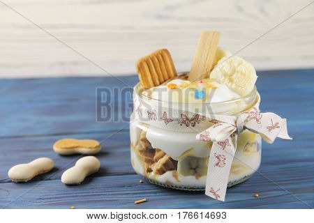 Delicious curd dessert with banana and caramel