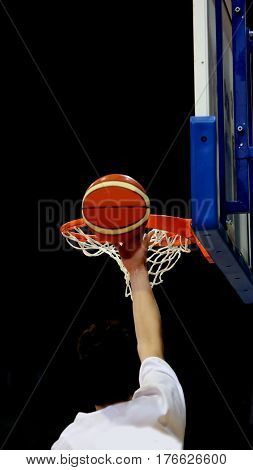 Basketball Player During The Crushing Of The Basket With The Bas