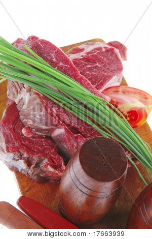 ready to cook: raw beef fillet mignon on cutting board prepared for roasting
