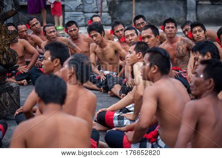 Bali Indonesia - March 03 2013: Kecak dance is a traditional ritual of Bali Indonesia.This dance is being shown at Uluwatu Temple.Blurred appearance of flowing dance.