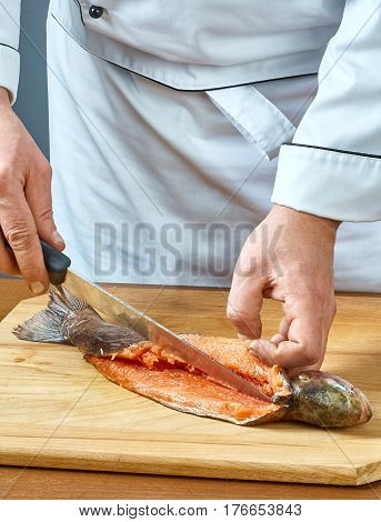 Cook cuts fish collection of food recipes