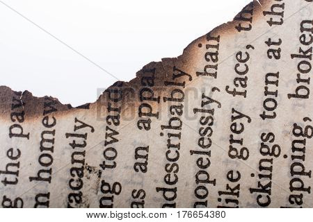 Burnt Texted Paper  On A White Background