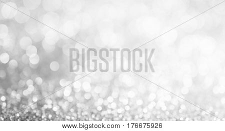 Silver And White Bokeh Lights Defocused. Abstract Background, Wide Fan Page Panorama Format.
