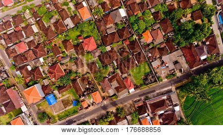 Beautiful landscape with balinese village and rice fields, Bali, Indonesia. Aerial view.