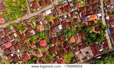 Beautiful landscape with balinese village and rice fields, Bali, Indonesia. Aerial view.