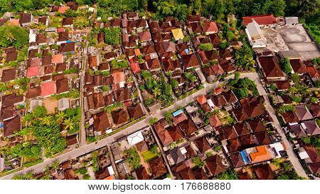 Beautiful landscape with balinese village and rice fields, Bali, Indonesia. Aerial view.