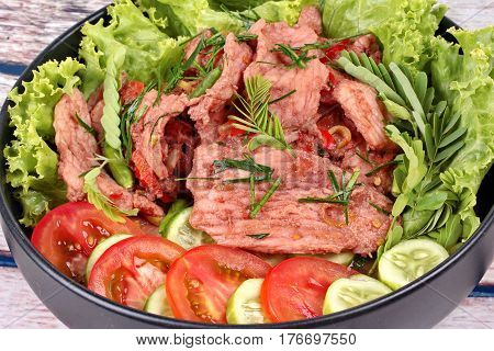 Spicy Fried Pork With Herb In Shrimp Paste Dip .