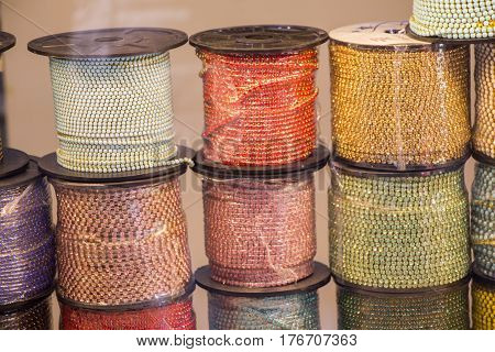 Set or rolls of colotful string on a background