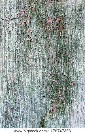 Texture of old cracked paint on a wooden wall