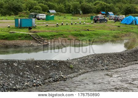 Kamchatka Peninsula, Russia - August 24, 2016: Malkinskie thermal mineral hot springs in Kamchatka
