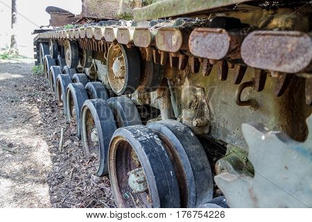 Battle tank in the moor of a forest