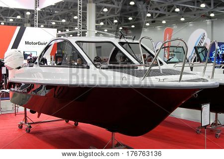 MOSCOW - MARCH 09 2017: Boat Phoenix 530 HT for 10 International boat show in Moscow. Russia.