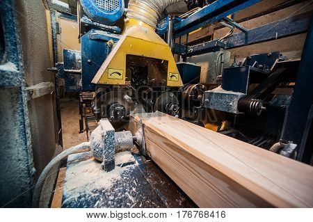Close Up Of A Straight Router Bit Cutting A Groove Or Rabbet In A Piece Of Oak