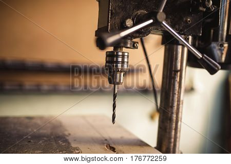 Close up of carpenter drill in the workshop.