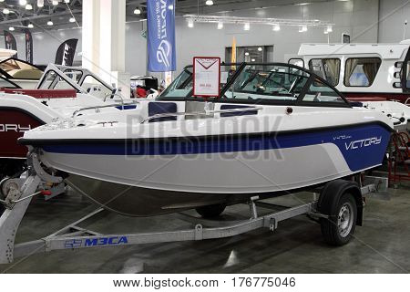 MOSCOW - MARCH 09 2017: Aluminum Boat Victory V 470 open for 10 International boat show in Moscow. Russia.