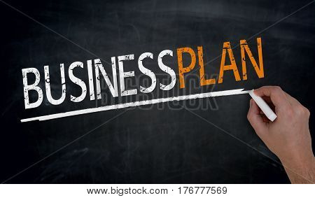 Businessplan Is Written By Hand On Blackboard