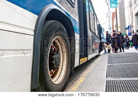 New York March 11 2017: People are boarding an MTA city bus in Manhattan.