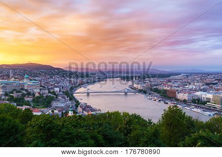 Evening panorama of Budapes from Gellert Hill with a beautiful sunset sky