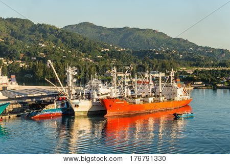 Victoria Mahe island Seychelles - December 15 2015: Attractive View of Ships Resting at the Port Victoria Mahe Island Seychelles at dawn.