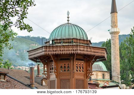 Sebilj and minaret in Sarajevo  - Bosnia and Herzegovina