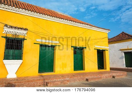 Yellow And Green Colonial Architecture