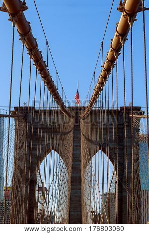 Stars And Stripes Flying On Brooklyn Bridge