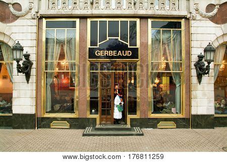 People Coming Out Of The Famous Gerbeaud Coffe Shop